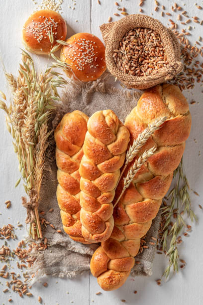 istock Rustic and fresh loaf of breads freshly baked. 1595951323