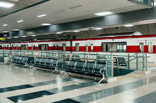 Empty interior in red line sky train is running in downtown of Bangkok, Thailand