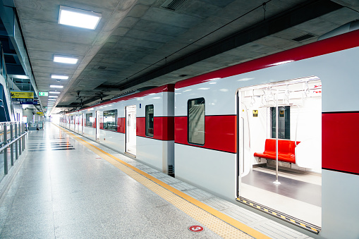 Red line sky train is running in downtown of Bangkok, Thailand