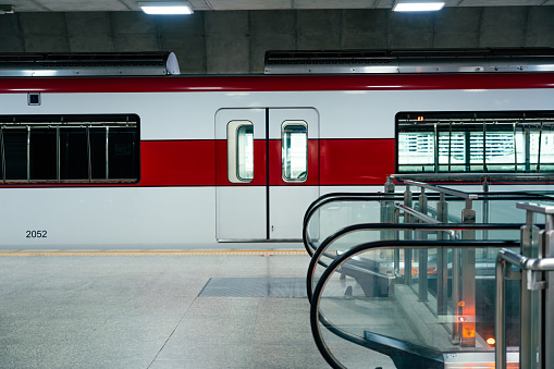 Red line sky train is running in downtown of Bangkok, Thailand