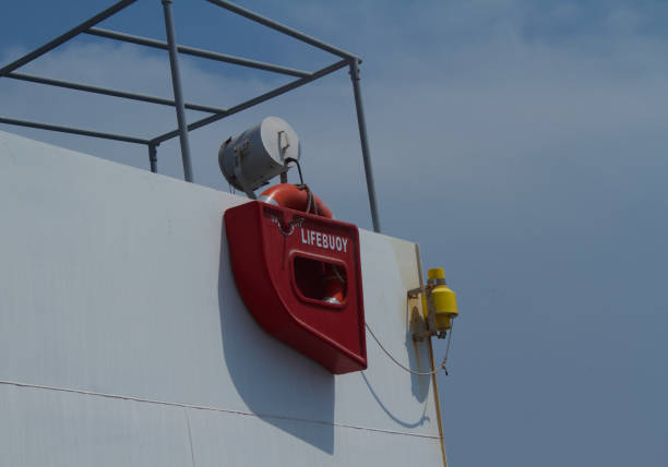 The lifebuoy fitted at the end of the bridgewings of a merchant ship to save persons if someone falls overboard.This lifebuoy is fitted with light indicator and radar transmitter for easy locating the casualty. These lifebuoys can be released quickly by lifting a lever