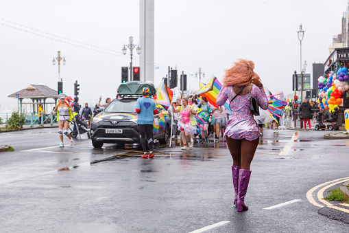 Brighton, England - August 5th 2023: NHS staff at the pride parade. The Brighton & Hove Pride Parade 2023 begins in wet and rainy conditions on August 05, 2023, in Brighton, England.