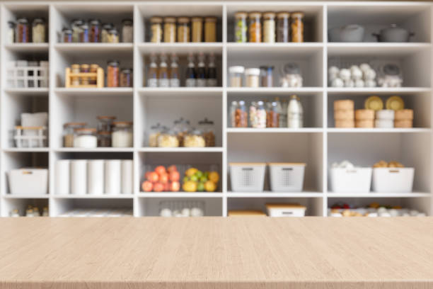 Empty Wooden Surface With Defocused Pantry Items On Kitchen Shelf Background