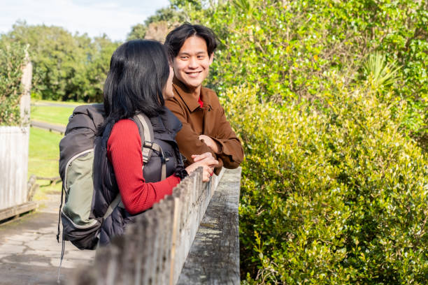istock Asian Couple Enjoying a Hike 1595977055