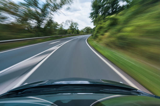 Motorway Infrastructure Front View of Driving Car through Streets