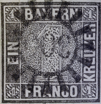 Nuremberg, Germany, October 2018, 29: GERMANY - CIRCA 1850 one kreuzer black, first German postage stamp issued in the Kingdom of Bavaria