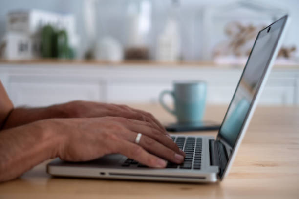 istock A person works from home with his laptop 1596004773