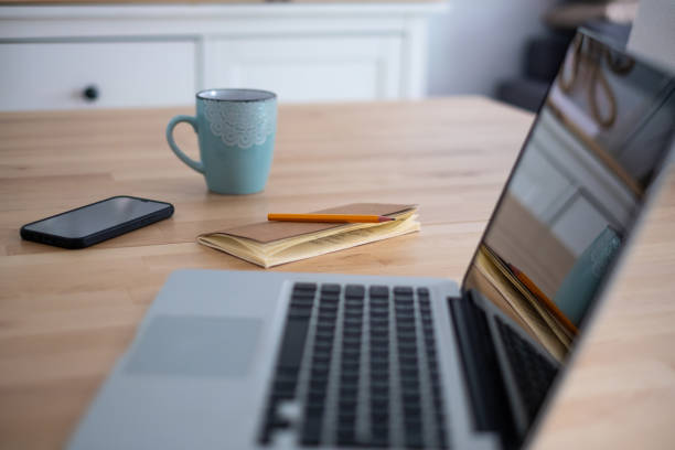 istock A notepad next to a smartphone, a cup of coffee and a computer 1596004775
