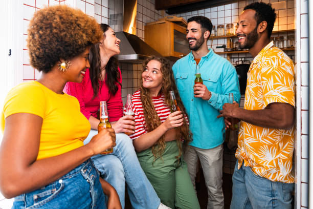 multiethnic group of friends having dinner barbecue party on rooftop at home - group of dogs flash imagens e fotografias de stock