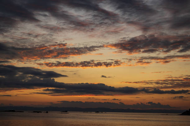 Sunset on the sea and clouds in the sky