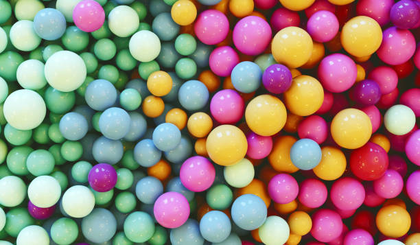 istock Pastel Colored Marbles Converge in Striking Design 1596103499