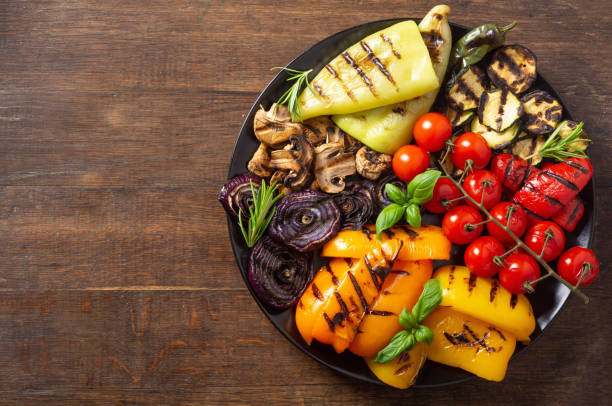istock Colorful grilled vegetables on a pan barbecue 1596113676