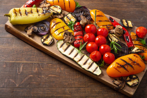 istock Colorful grilled vegetables on a pan barbecue 1596113696