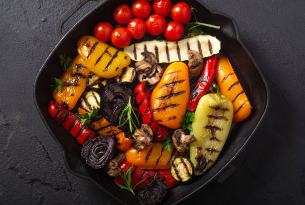 istock Colorful grilled vegetables on a pan barbecue 1596113700