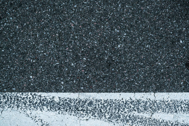 Road marking on asphalt close-up