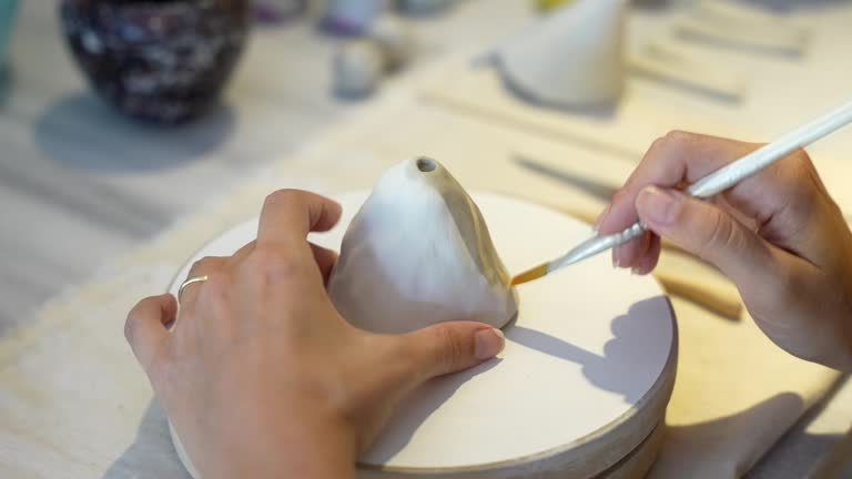 close up of coloring ceramics in the workshop