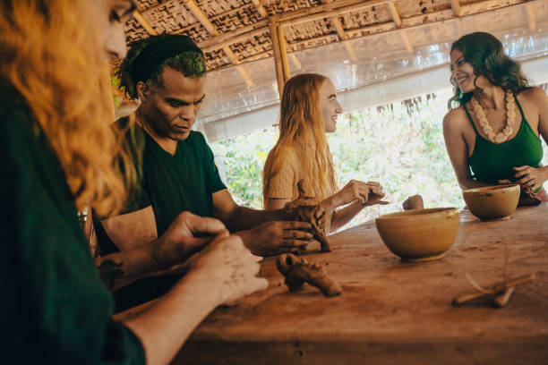 istock A diverse group of friends participate in a pottery workshop 1596263591