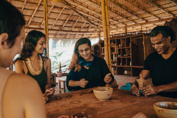 istock A diverse group of friends participate in a pottery workshop 1596264132