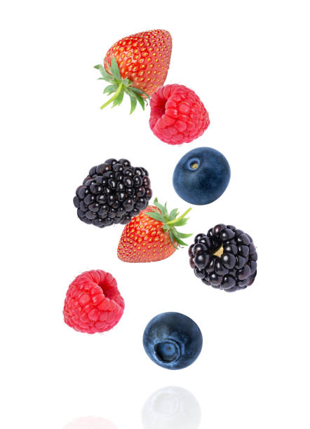 istock Fresh mix berries fruit with red raspberry, strawberry, blackberry and blueberry isolated on white 1596302770