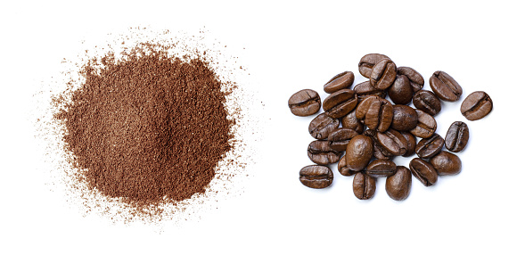 Ground coffee (coffee powder) and roast coffee beans isolated on white background. Top view. Flat lay.