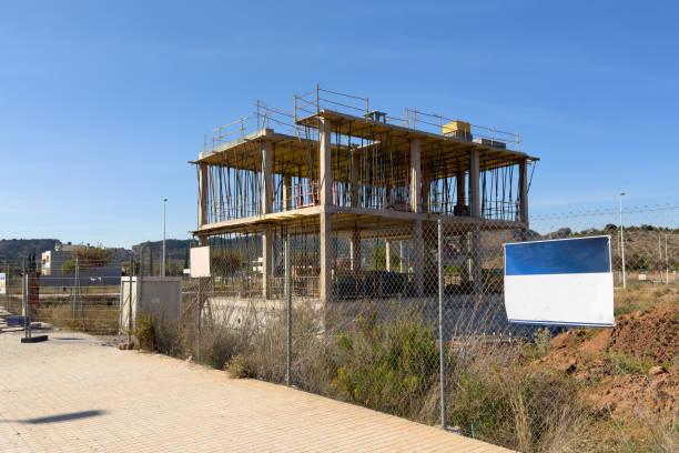 House under construction. Townhouse on Construction site. Luxury villa under construction near beach of Mediterranean sea. Construction of modern house near coastline. Home renovation near ocean.