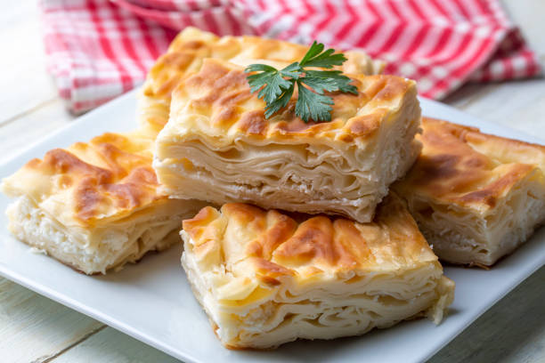 istock Delicious Turkish food; Tray pastry; (Turkish name; Su boregi) 1596374549