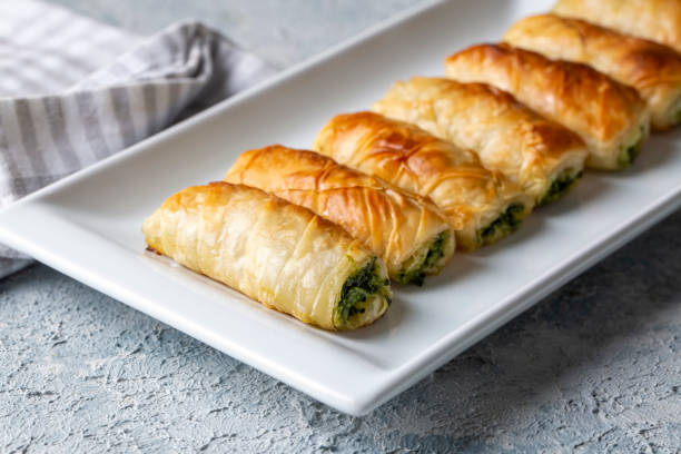 istock Turkish Tepsi Boregi, Round Borek, Tray pastry (Turkish name; rulo borek - sigara boregi) 1596377168