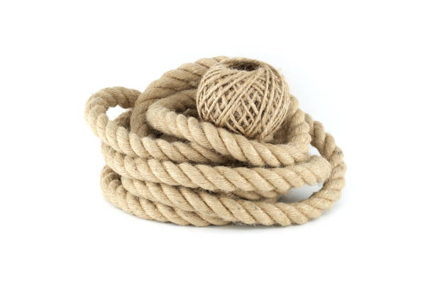 istock Thick strong jute rope and twine spool on white 1596430108