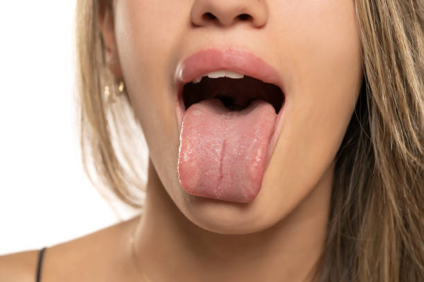 istock Front view of a woman tongue 1596436062