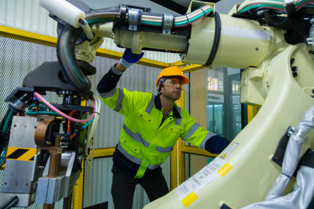 istock Robot engineers invent robots of the future that can replace humans. 1596436704