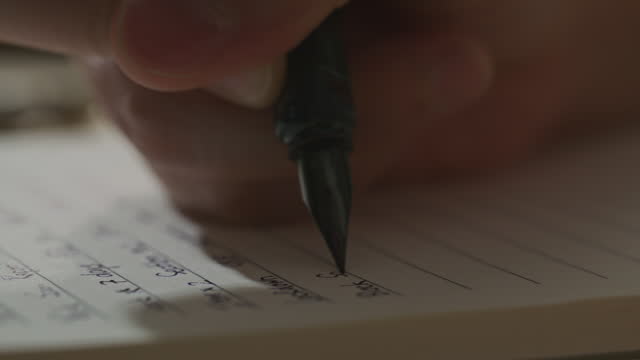 Woman Writing on note