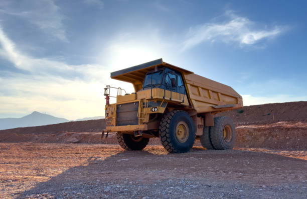 istock Mining truck in open-pit mining. Construction equipment on soil transport. 1596476927