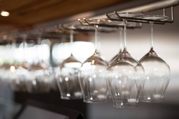 istock empty clean glass glasses for alcoholic drinks in a restaurant on a bar counter 1596476960