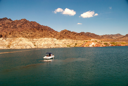Water ski boat on a lake with a low water line at Lake Mead Nevada in August 2005