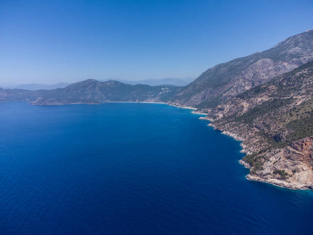 istock beautiful landscape from a drone on the sea, mountains 1596573157