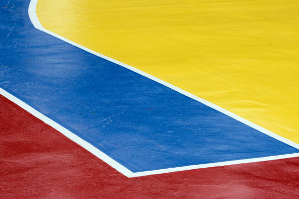 istock blue and yellow sports field 1596629162