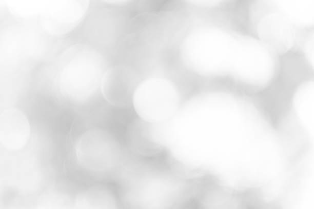 istock Gray white light bokeh background is a shiny naturally grey occurring shadow that is not clear but beautiful. 1596683282