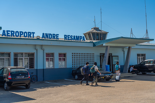 Morondava, Madagascar - June 01.2023: Morondava airport building Andre Resampa with sign and people
