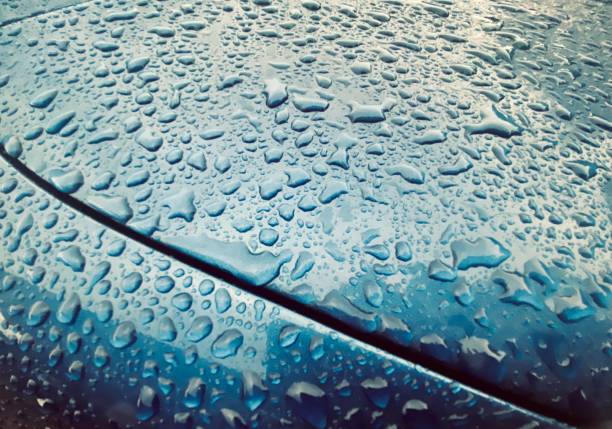 istock Water drops on a blue metallic surface unique stock photo 1596753243