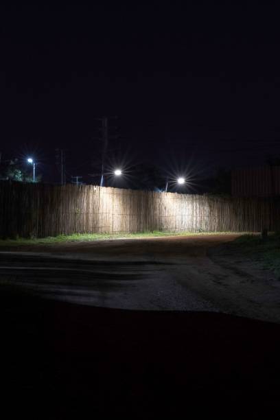 istock wooden fence at night 1596829123