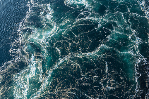 Air bubbles in clear blue water in pool (underwater shot), good for backgrounds