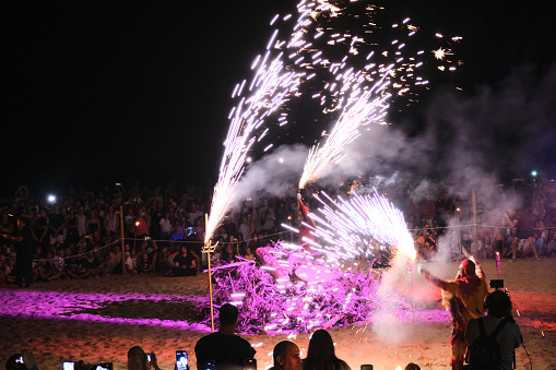 Ignition of the bonfire on the shore of the beach on the day of San Juan (pagan ritual). The actors dance on the beach around the burning bonfire