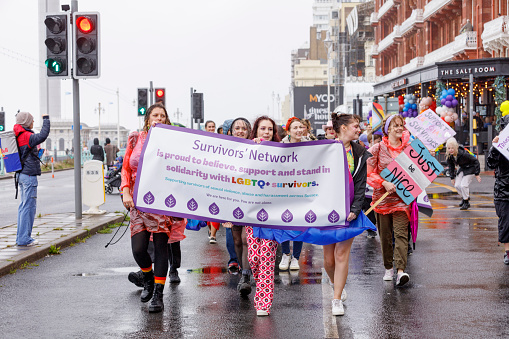 Brighton, England - August 5th 2023: Survivors Network at the pride parade. The Brighton & Hove Pride Parade 2023 begins in wet and rainy conditions on August 05, 2023, in Brighton, England.