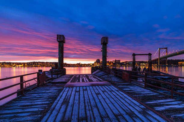 Old jetty and new bridge at night, Gothenburg, Sweden, Europe