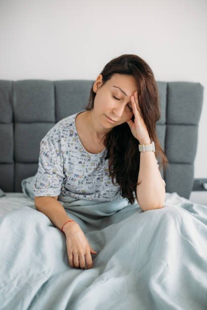 istock desperate woman sitting on the floor and struggles with depression 1596909140