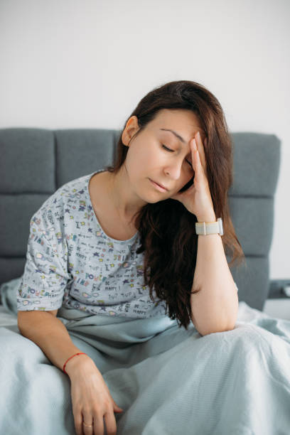 istock desperate woman sitting on the floor and struggles with depression 1596909655