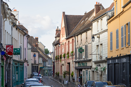 Montfort-l'Amaury, France, August 4, 2023; Narrow street in the picturesque village Montfort-l'Amaury.