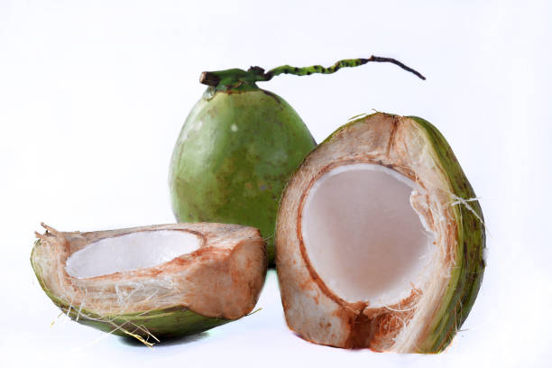 istock green coconut from Bahia Natural coconut juice tropical fruit in half fruit with white background 1596974143