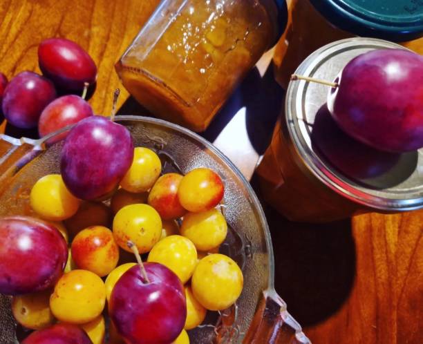 istock Quetsche jam and small yellow plums 1596994988