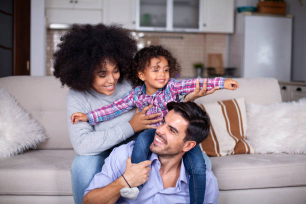 Playful young family stock photo